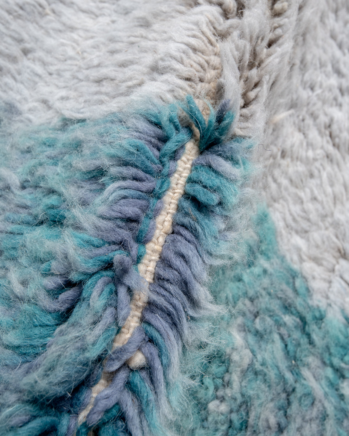 Modern, designer, handcrafted Berber rug from Morocco. Beniourain carpet with beautiful colours and patterns and fluffy wool texture.
